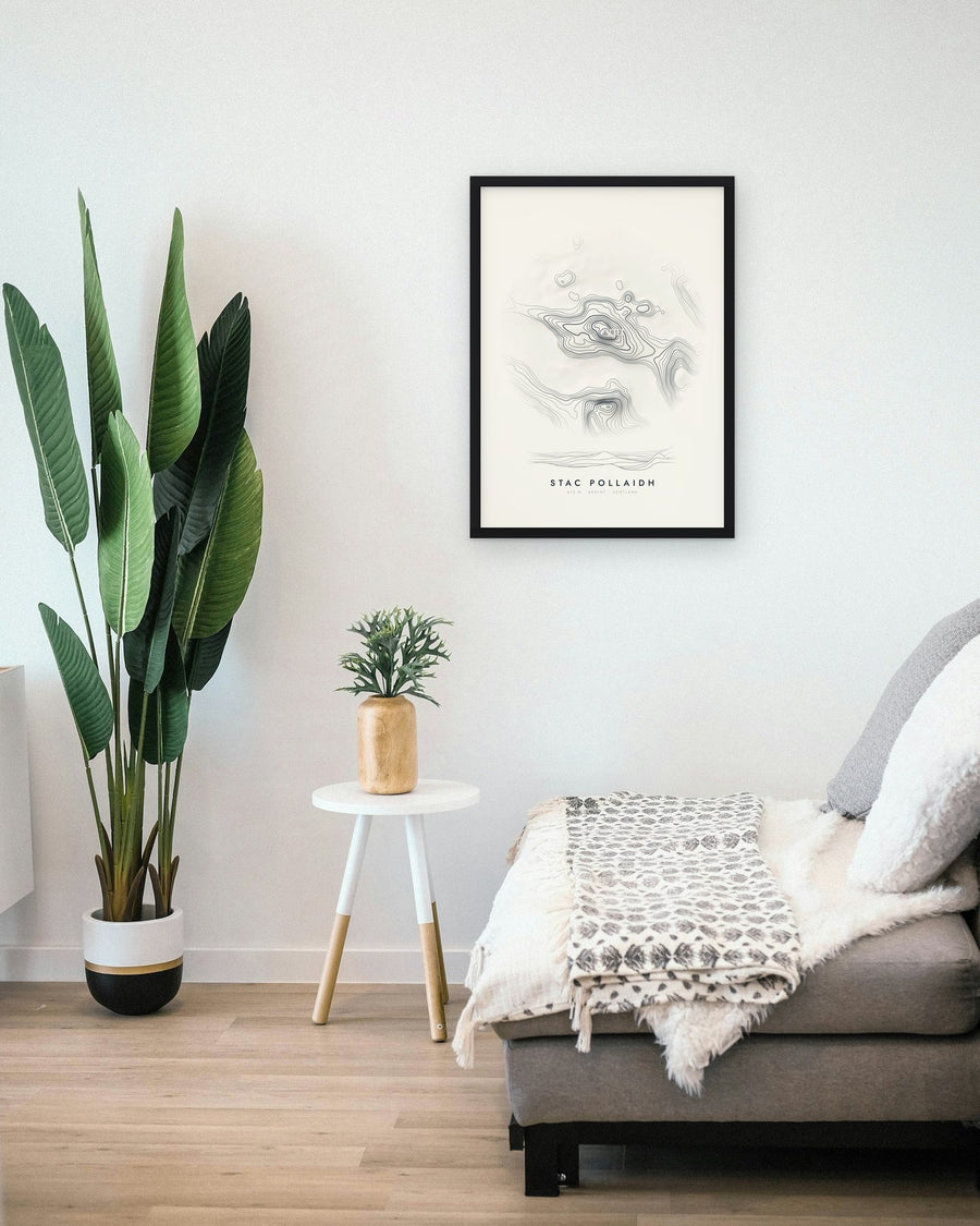 Stac Pollaidh contour print shown framed on a living room wall (frame not included)